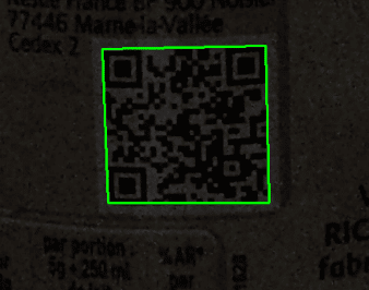 Dark image showing a barcode being scanned by the Viziotix barcode scanner SDK even though there is very low light. For automation barcode scanning. Viziotix barcode reader SDK. Viziotix barcode decoder SDK.