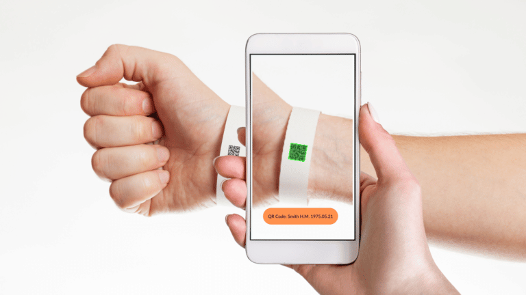A smartphone scanning a QR Code on a patient's healthcare wristband. The barcode is highlighted in green by the Viziotix fast barcode scanner SDK. Viziotix barcode reader SDK. Viziotix barcode decoder SDK.